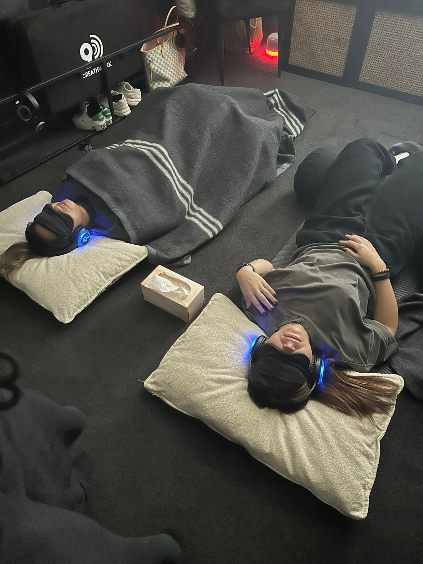 Two clients in semi-private breathwork session