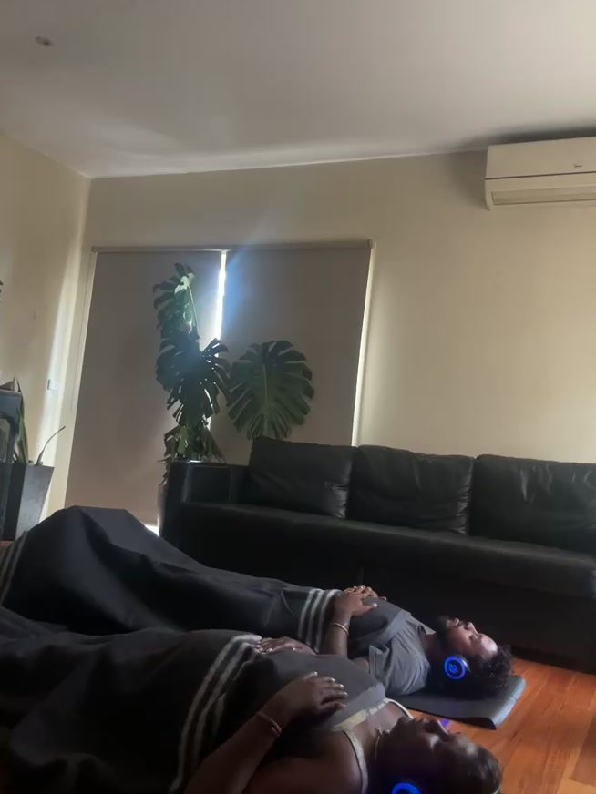 Male client resting during a private 9D breathwork session